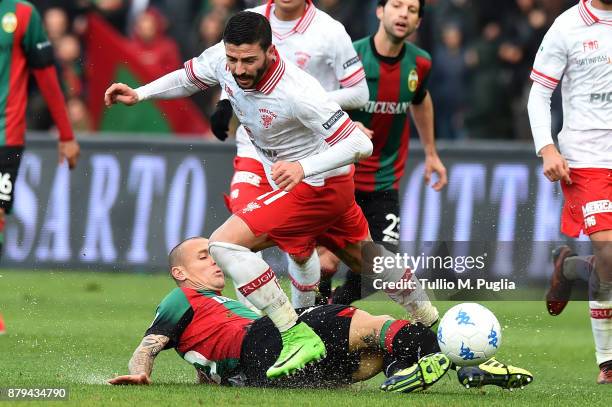 Marino Defendi of Ternana and Cristian Buonaiuto of Perugia compete for the ball during the Serie A match between Ternana Calcio and AC Perugia at...