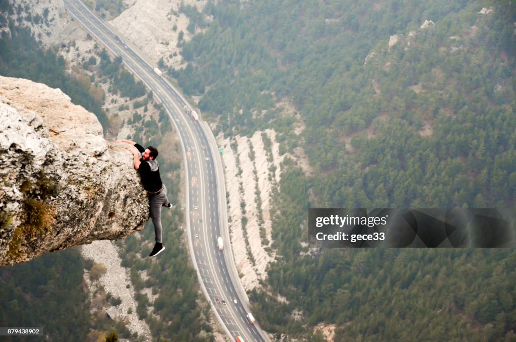 Mountain Man Success Concept on high Rock