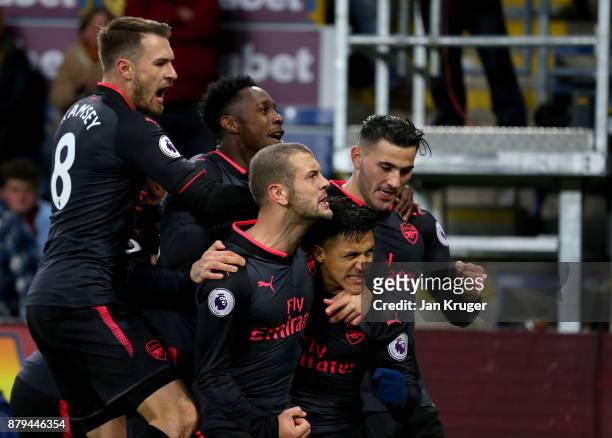 Alexis Sanchez of Arsenal celebrates scoiring the first goal with Aaron Ramsey, Jack Wilshere, Danny Welbeck and Sead Kolasinac of Arsenal during the...