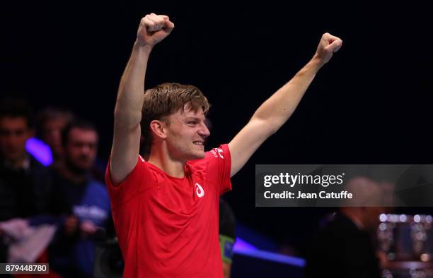 David Goffin of Belgium celebrates winning his match against Jo-Wilfried Tsonga of France during day 3 of the Davis Cup World Group final between...