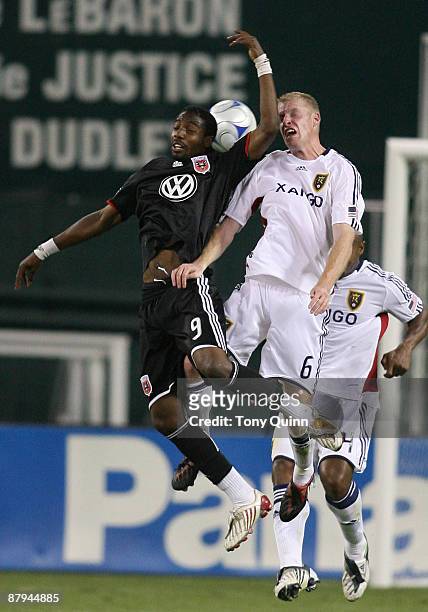 Ange N'Silu of D.C. United goes for a header with Nat Borchers of Real Salt Lake at RFK Stadium on May 23, 2009 in Washington, DC. The game ended in...
