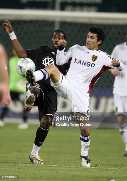Ange N'Silu of D.C. United challenges for the ball with Tony Beltran of Real Salt Lake at RFK Stadium on May 23, 2009 in Washington, DC. The game...