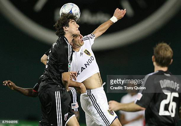 Dejan Jakovic of D.C. United goes for a header with Yura Movsisyan of Real Salt Lake at RFK Stadium on May 23, 2009 in Washington, DC. The game ended...