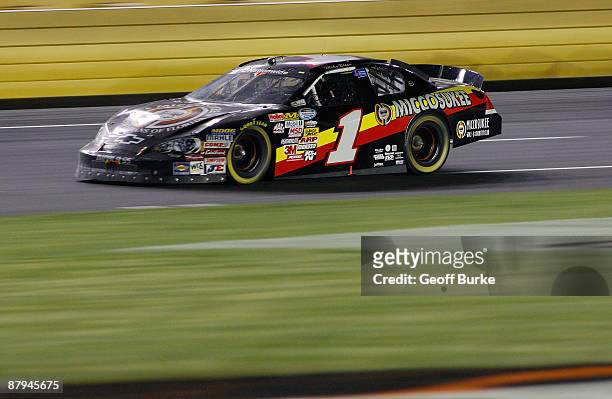 Mike Bliss, driver of the Miccosukee Indian Gaming & Resort Chevrolet, races during the NASCAR Nationwide Series CARQUEST Auto Parts 300 on May 23,...