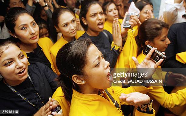 This photograph taken on October 15 shows laid-off Jet Airways employees shouting slogans during a gathering in Mumbai. India's airlines are caught...