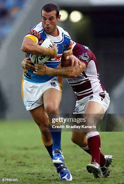 Anthony Laffranchi of the Titans takes on the Sea Eagles defence during the round 11 NRL match between the Gold Coast Titans and the Manly Warringah...
