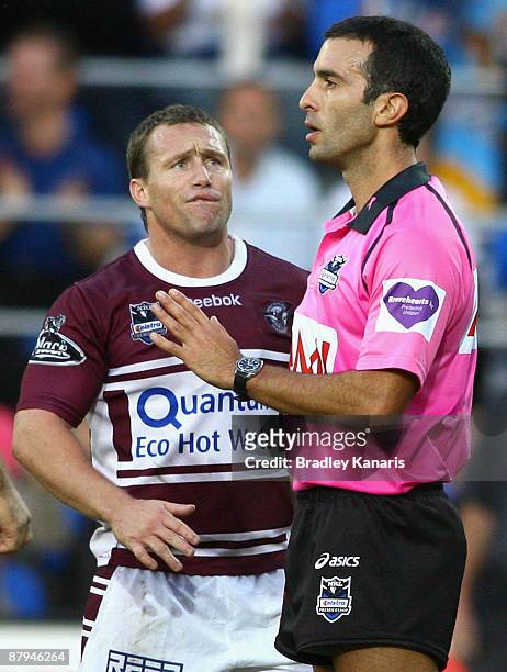 Matt Orford of the Sea Eagles disputes a decision by referee Matt Cecchin during the round 11 NRL match between the Gold Coast Titans and the Manly...