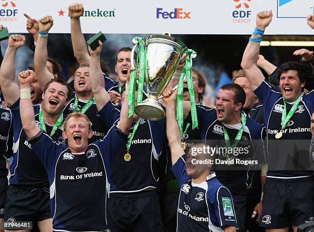 Leo Cullen captain of Leinster raises the Heineken Cup with team mate Chris Whitaker after winning the Heineken Cup Final between Leicester Tigers...