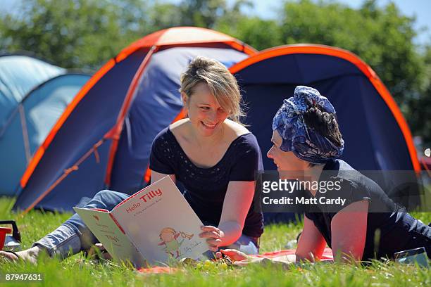 Festival-goers relax in front of their tent during the fourth day of the Guardian Hay Festival 2009 on May 24, 2009 in Hay-on-Wye, Wales. Sky Arts...