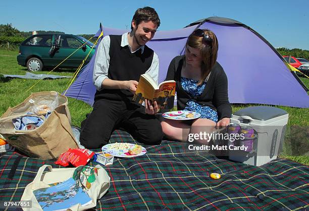 Festival-goers relax in front of their tent during the fourth day of the Guardian Hay Festival 2009 on May 24, 2009 in Hay-on-Wye, Wales. Sky Arts...