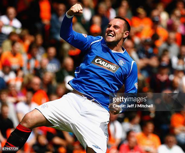 Kris Boyd of Rangers celebrates after scoring during the Scottish Premier League match between Dundee United and Rangers at Tanadice Park on May 24,...