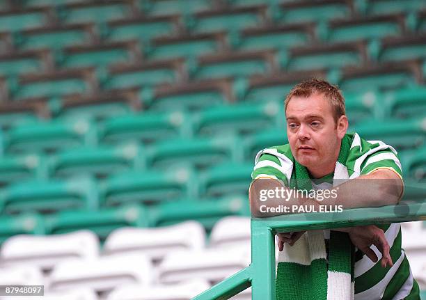 Disappointed Celtic supporter in the stands after Celtic's goal-less draw in the Scottish Premier League football match against Hearts at Celtic Park...