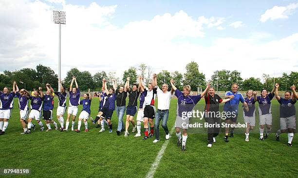 The team of TeBe Berlin celebrates the ascension to the First Bundesliga after winning the Women's Second Bundesliga match between Tennis Borussia...