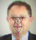 Face detection biometric software recognising pixellated mosaic image of a man