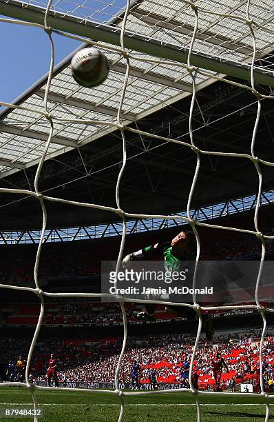Gary Alexander of Millwall beats keeper Joe Murphy of Scunthorpe to score a goal during the Coca-Cola League One Playoff Final between Millwall and...