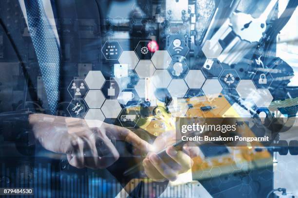 double exposure of engineer or technician man with business industrial tool icons, enguneer using tablet with industrial business concept. industry 4.0 concept - industry 4 0 imagens e fotografias de stock