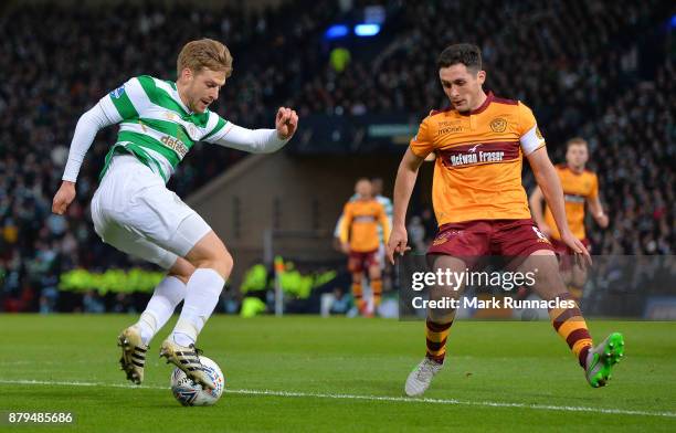 Stuart Armstrong of Celtic takes on Carl McHugh of Motherwell during the Betfred League Cup Final between Celtic and Motherwell at Hampden Park on...