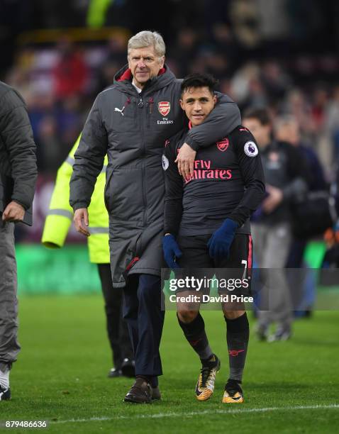 Arsene Wenger the Arsenal Manager with Alexis Sanchez after the Premier League match between Burnley and Arsenal at Turf Moor on November 26, 2017 in...