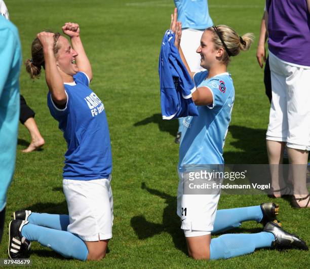 Julia Leykauf and Laura Vetterlein of Saarbruecken celebrate the ascension to the First Bundesliga after winning the Women's 2. Bundesliga match...