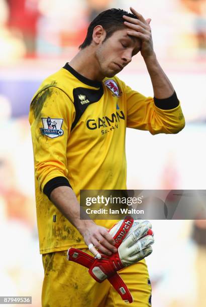 Brad Jones of Middlesbrough looks dejected following the Barclays Premier League match between West Ham United and Middlesbrough at Upton Park on May...