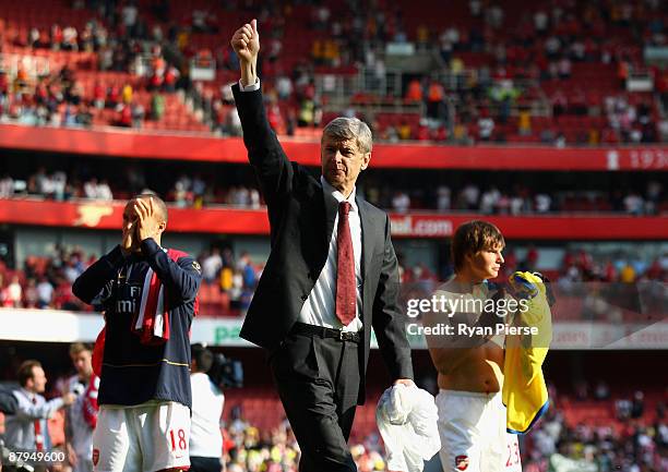 Arsene Wenger,manager of Arsenal, waves to the fans after the Barclays Premier League match between Arsenal and Stoke City at Emirates Stadium on May...