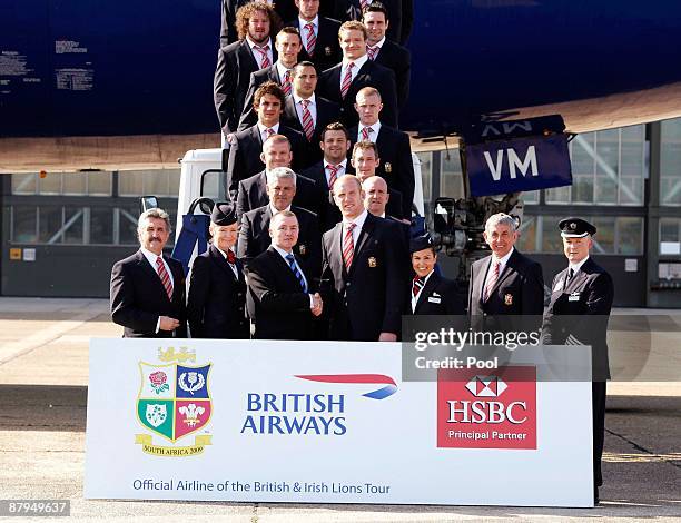 Chief Executive Wille Walsh shakes hands with the British & Irish Lions captain Paul O'Connell as the British & Irish Lions tour team prepare to...