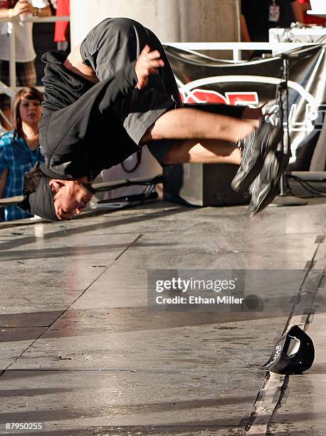 Casanova does a backflip while performing with rap duo HardNox during 98.5 KLUC's "Summer Jam 2009" concert at the Henderson Pavilion May 23, 2009 in...