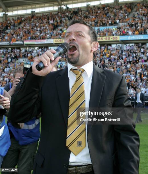Phil Brown the Hull City manager celebrates after the Barclays Premier League match between Hull City and Manchester United at the KC Stadium on May...