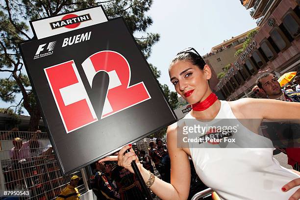 Grid girl of Sebastien Buemi of Switzerland and Scuderia Toro Rosso is seen before the Monaco Formula One Grand Prix at the Monte Carlo Circuit on...