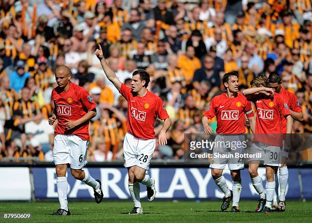 Darron Gibson of Manchester United celebrates after scoring during the Barclays Premier League match between Hull City and Manchester United at the...