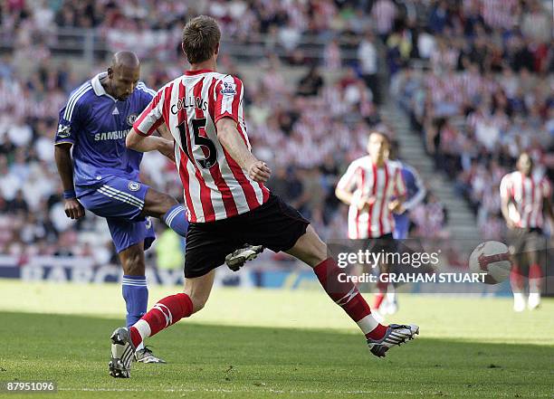 Chelsea's French striker Nicolas Anelka scoring against Sunderland to become leading Premier League goalscorer of the season during the English...