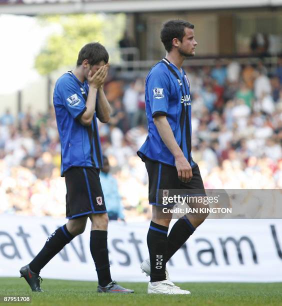 Middlesbrough's Adam Johnson and Middlesbrough's Matthew Bates at the final whistle as Middlesbrough are relegated after being beaten 2-1 by West Ham...