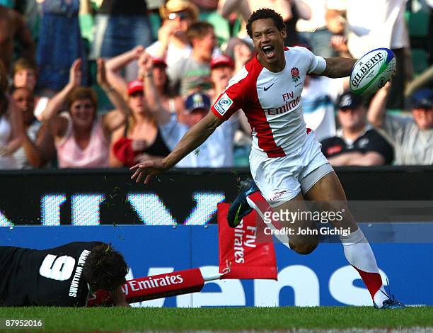 Dan Norton of England celebrates after crossing the line for a try in the IRB London Sevens final match between England and New Zealand during day...