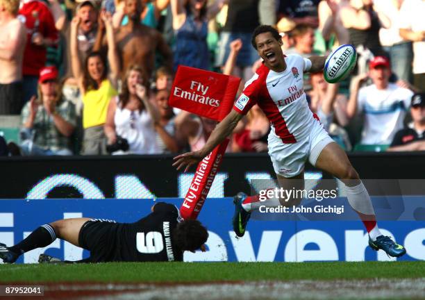 Dan Norton of England celebrates after crossing the line for a try in the IRB London Sevens final match between England and New Zealand during day...