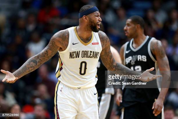 DeMarcus Cousins of the New Orleans Pelicans reacts to a call during the first half of a NBA game against the San Antonio Spurs at the Smoothie King...