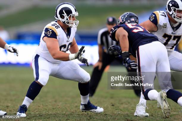 Austin Blythe of the Los Angeles Rams blocks during the first half of game against the Houston Texans at Los Angeles Memorial Coliseum on November...