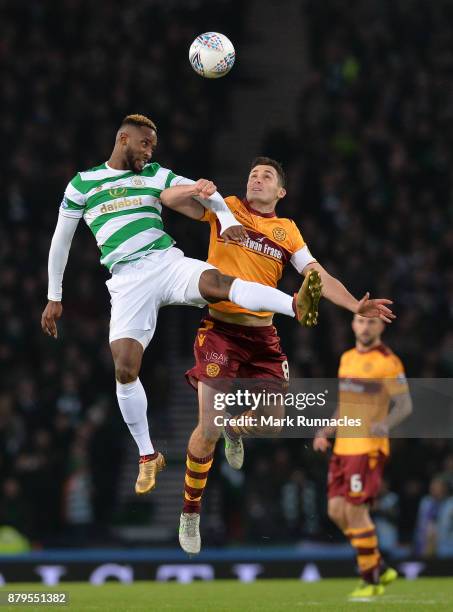 Moussa Dembele of Celtic and Carl McHugh of Motherwell challenge for the ball during the Betfred League Cup Final between Celtic and Motherwell at...