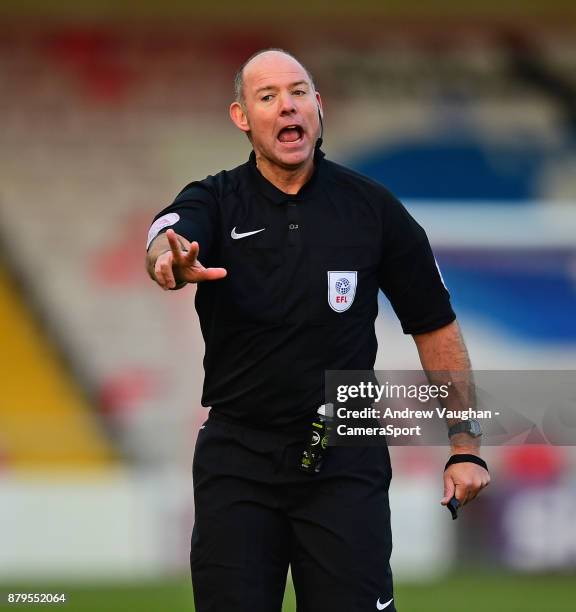 Referee Andy Haines during the Sky Bet League Two match between during the Sky Bet League Two match between Lincoln City and Port Vale at Sincil Bank...