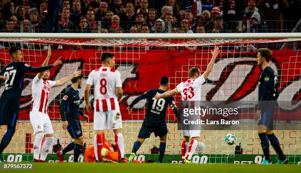 Vedad Ibisevic of Berlin scores his teams first goal during the Bundesliga match between 1. FC Koeln and Hertha BSC at RheinEnergieStadion on...