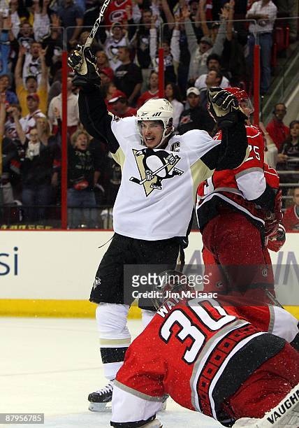Sidney Crosby of the Pittsburgh Penguins celebrates his first period goal against the Carolina Hurricanes during Game Three of the Eastern Conference...