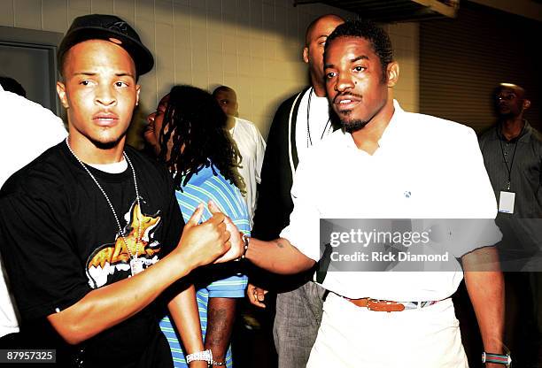 Rapper T.I. And Andre 3000 of OutKast backstage at the Philips Arena on May 24, 2009 in Atlanta, Georgia.