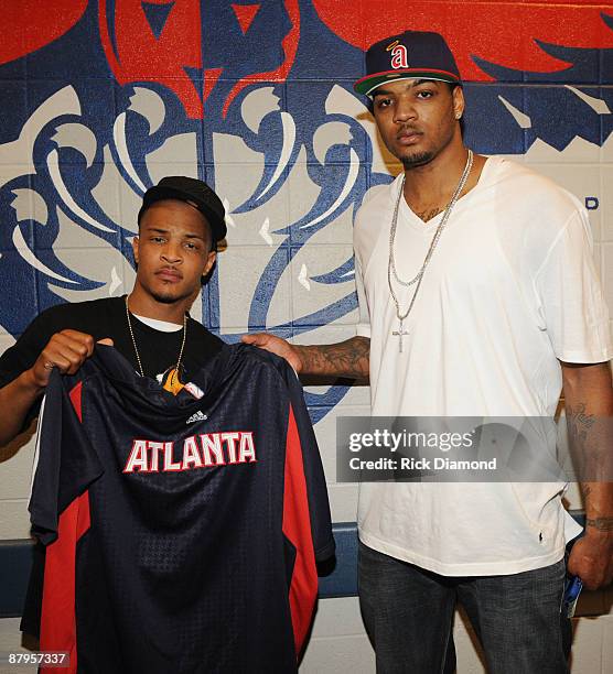 Rapper T.I. And Atlanta Hawk, Josh Smith backstage at the Philips Arena on May 24, 2009 in Atlanta, Georgia.