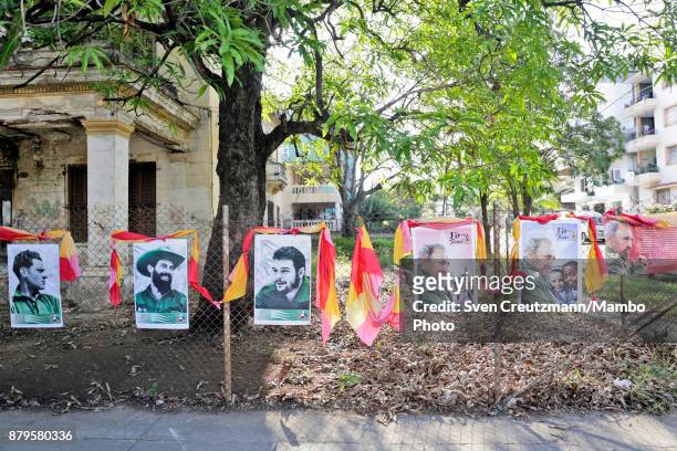 Photos of late Revolution leader Fidel Castro, Che Guevara , Camilo Cienfuegos and Antonio Mella are at display in front of the premise where Castro...