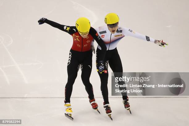 Jin Lim Yong of Korea and Jia Haidong of China compete in the Men's 777m final duirng the 2017 Shanghai Trophy at the Oriental Sports Center on...