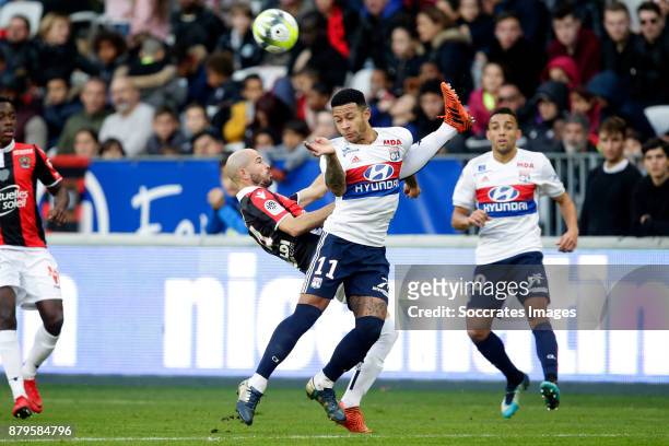 Christophe Jallet of Nice, Memphis Depay of Olympique Lyon during the French League 1 match between Nice v Olympique Lyon at the Allianz Riviera on...