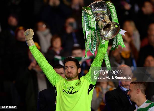 Craig Gordon of Celtic lifts the trophy after winning the Betfred League Cup during the Betfred League Cup Final between Celtic and Motherwell at...