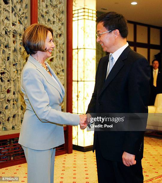 Nancy Pelosi speaker of the United States House of Representatives shakes hands with Han Zheng, Mayor of Shanghai on May 25, 2009 in Shanghai, China....