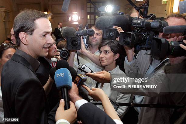 Eric Roux, head of the Paris Celebrity Center of the Scientology Association speaks to journalists as he arrives at Paris Court in May 25 for the...