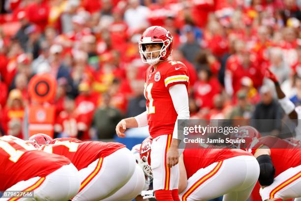 Quarterback Alex Smith of the Kansas City Chiefs audibles a call against the Buffalo Bills during the first quarter of the game at Arrowhead Stadium...