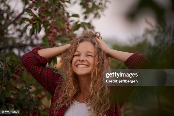 find joy in the simple moments - touching hair stock pictures, royalty-free photos & images